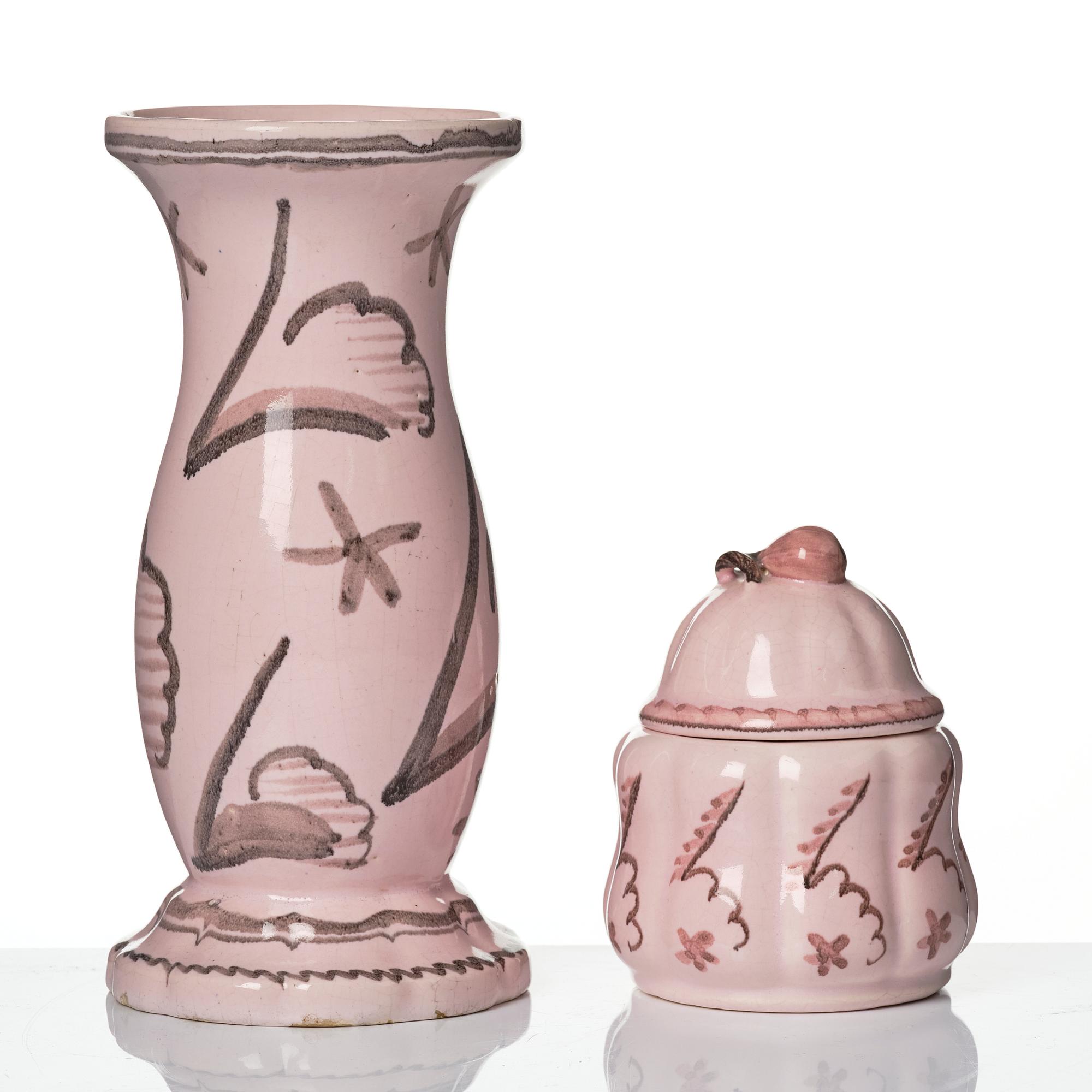 Wilhelm Kåge, Two earthenware vases, a lamp base and a jar with cover, Gustavsberg, Sweden, dated 1920.
