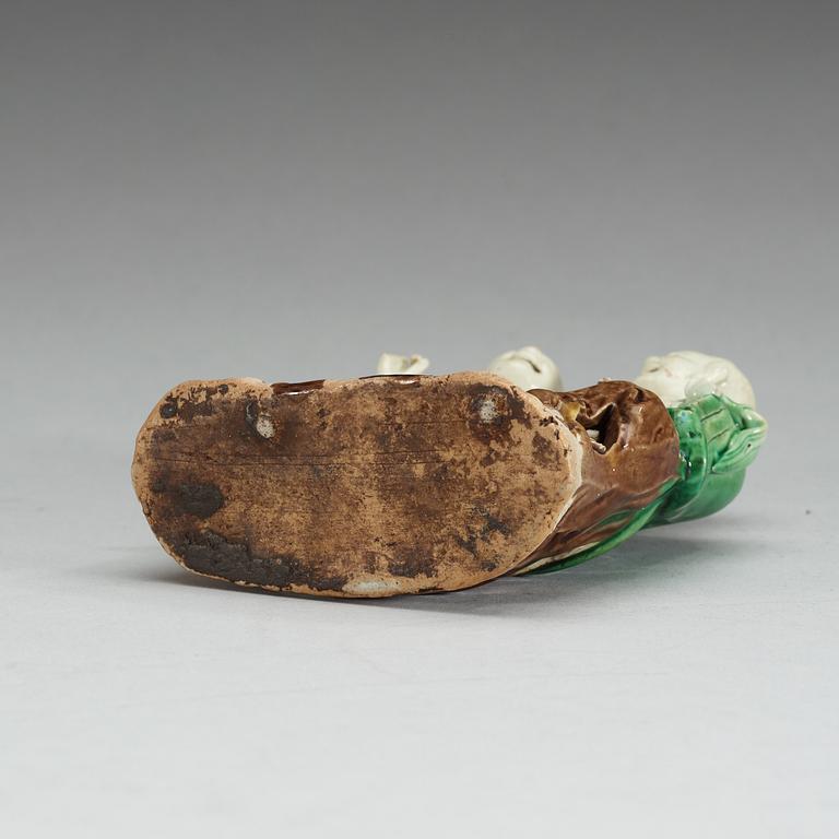 A figure of 'laughing boys', Qing dynasty, 18th Century.