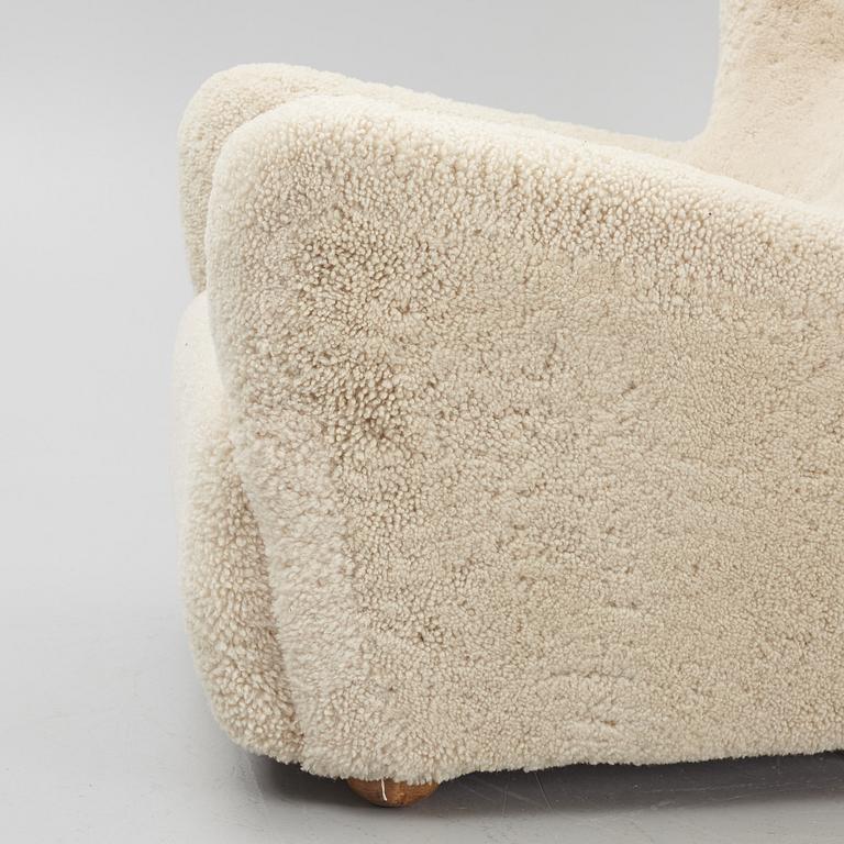 A pair of Danish Modern sheepskin armchairs, 1930's/40's.