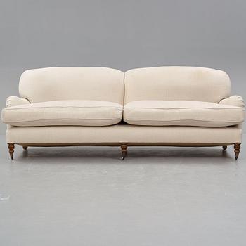 SOFA, "Howard", upholstered in an off-white fabric.