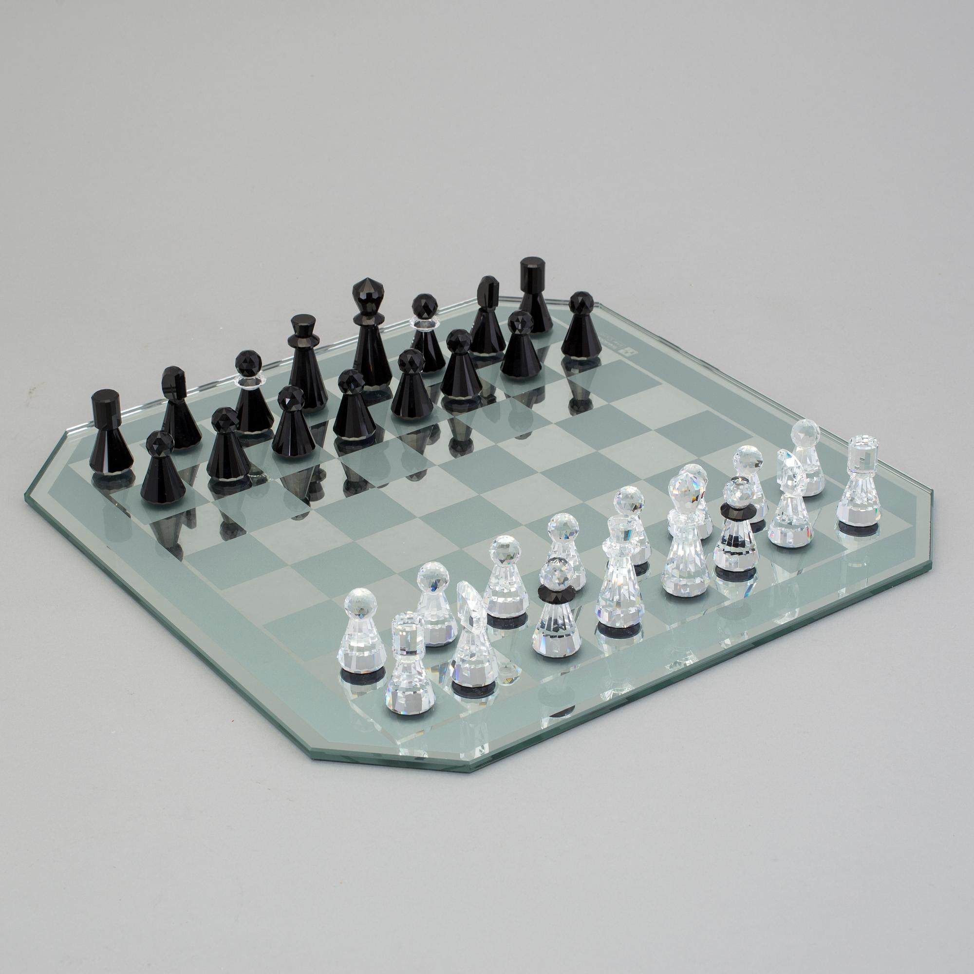 A SWAROVSKI CHESS SET.