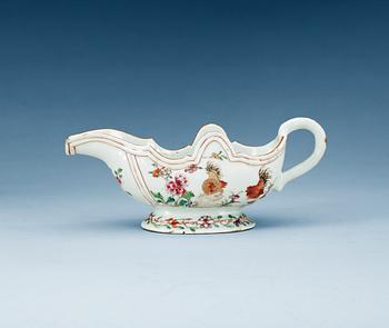 1447. A famille rose rooster sauce boat, Qing dynasty, Qianlong (1736-95).
