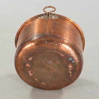 A copper cauldron, 19th century.