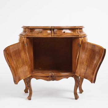 An Italian Louis XV-style bombé commode, 20th century.