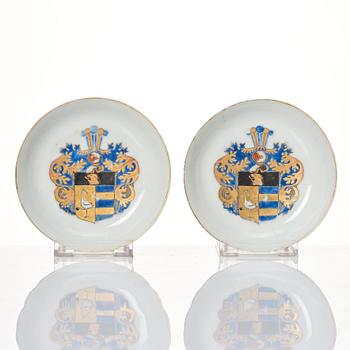 A pair of armorial cups with saucers, Qing dynasty, Qianlong (1736-95).