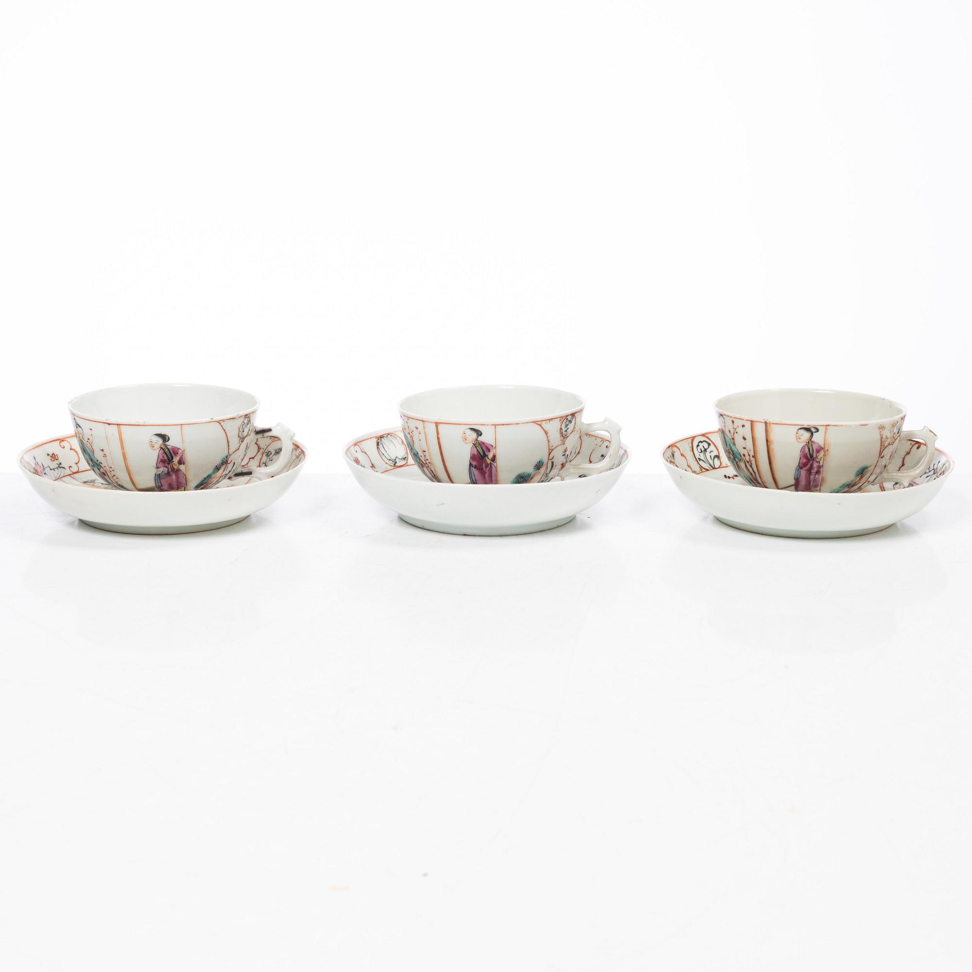 Parti, porslin samt fat i emalj på koppar, nio delar. Qingdynastin, 1700-tal.