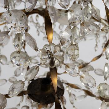A late Gustavian gilt brass and cut glass seven-light chandelier, Stockholm, late 18th century.