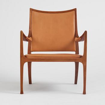 Hans Asplund, a walnut and leather easy chair, Nordiska Kompaniet, ca 1955, for the Nordiska Kompaniet beauty salon.