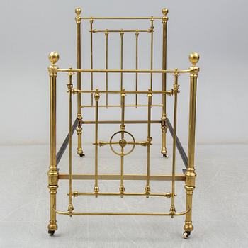 A late 19th or early 20th century bedframe.