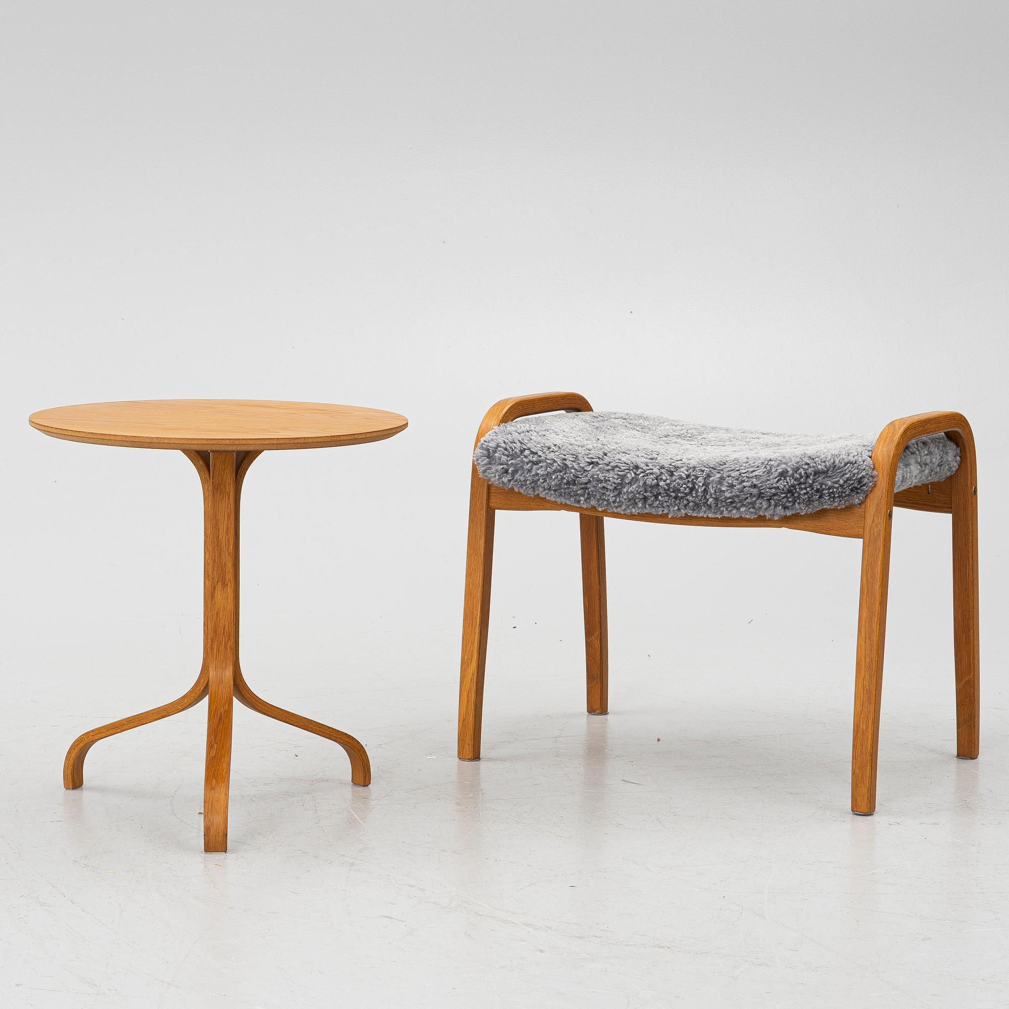 Yngve Ekström, A pair of armchairs, a footstool, “Lamino”, and a side table, Swedese, 2000s.