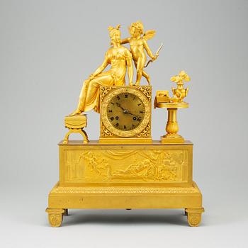 A French Empire pendulum clock, early 19th century.