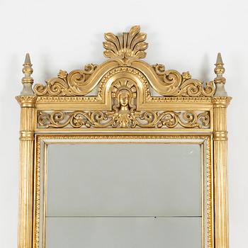 A Empire style mirror, second half of the 19th Century.