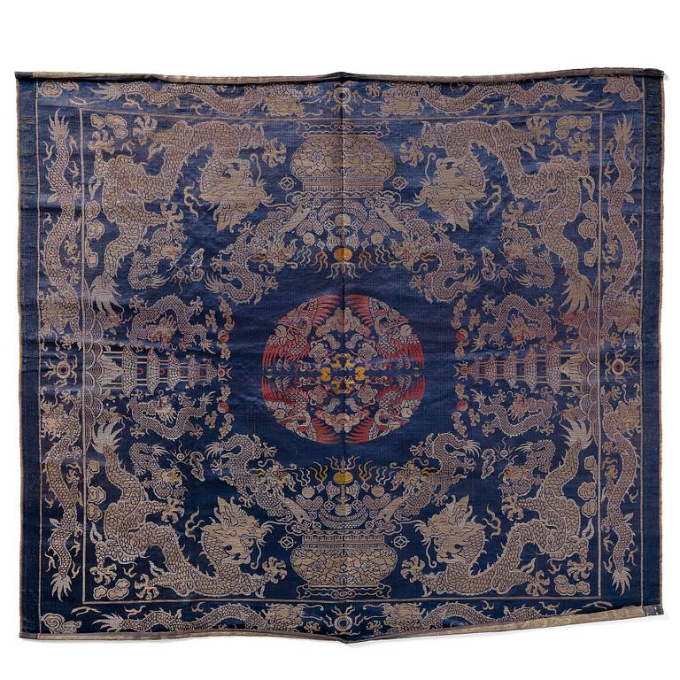 A silk blue-ground brocade panel, late Qing dynasty/early 20th century.