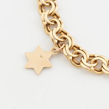 Bracelet 18K gold, bismarck, with two pendants 14K gold.
