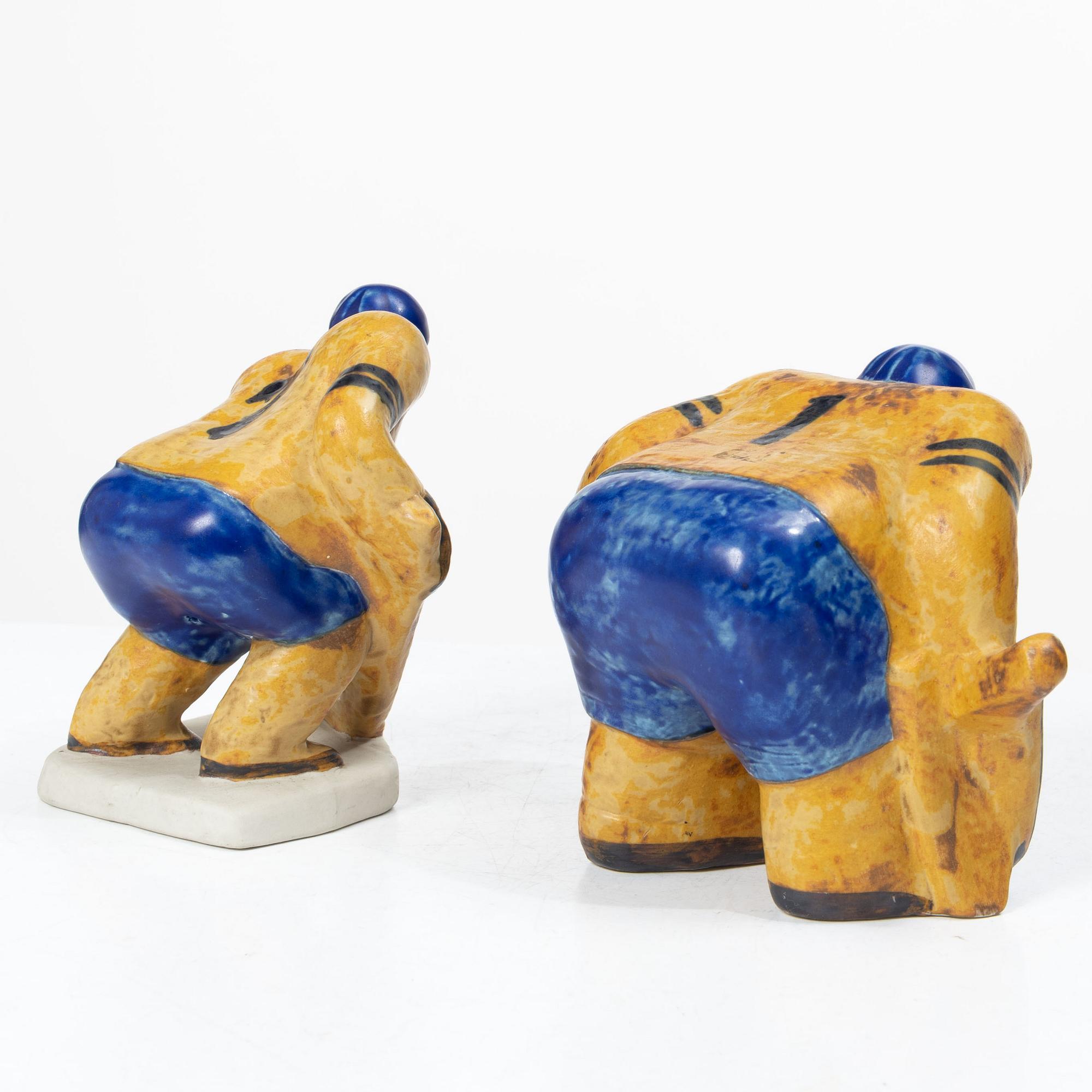 Lisa Larson, Two figurines, ice hockey players, stoneware, Gustavsberg.