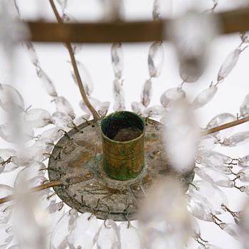 A late-Gustavian five-light gilt brass and cut glass chandelier, Stockholm, circa 1800.
