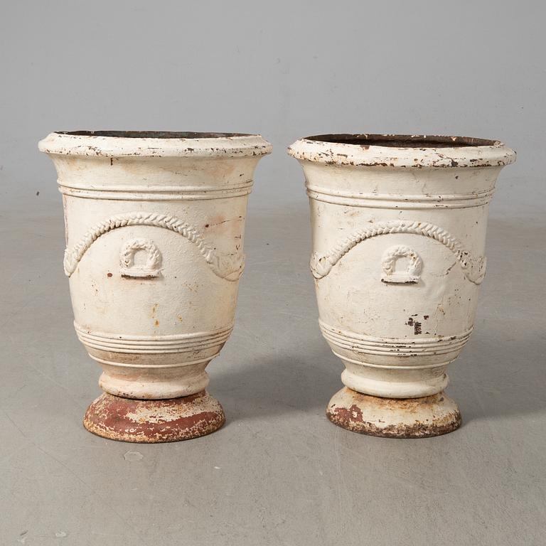 Urnor ett par gjutjärn omkring 1900.