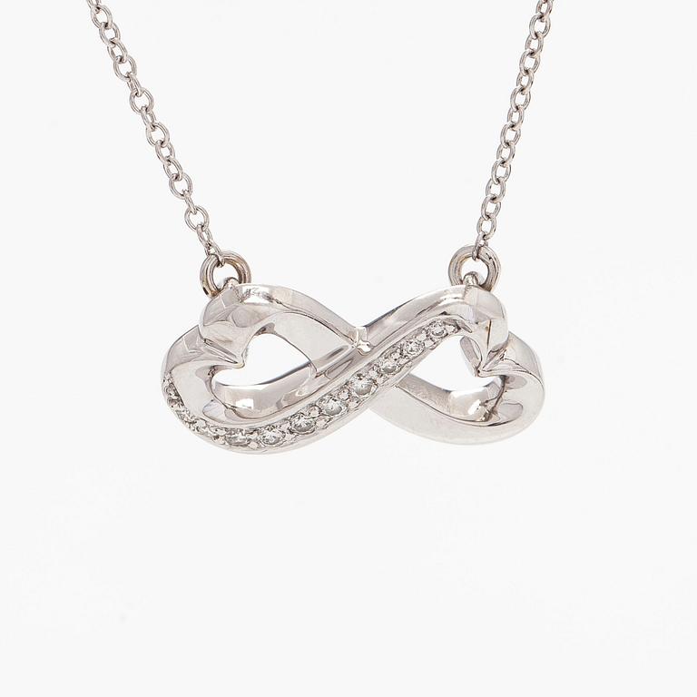 Tiffany & Co, Paloma Picasso, "Double Loving Heart" kaulakoru, 18K valkokultaa ja briljanttihiottuja timantteja.