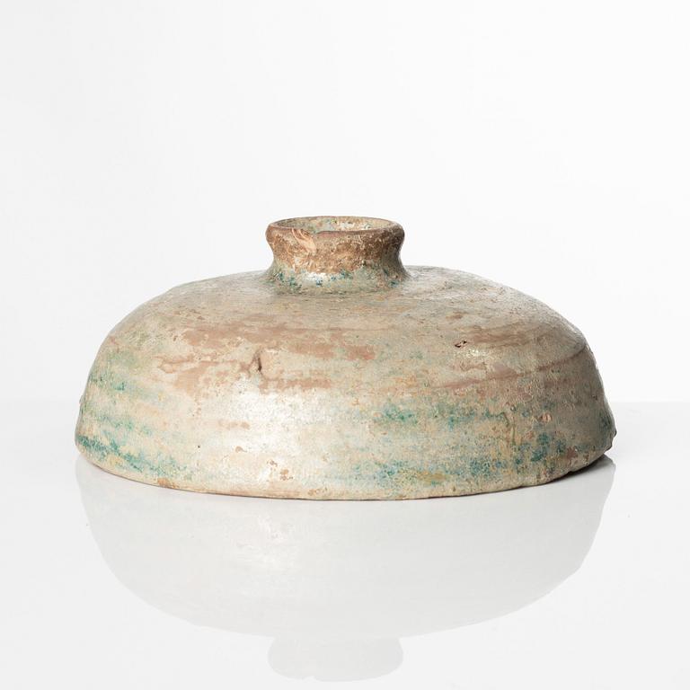 A green glazed cover, Han dynasty (206 B.C. - 220 A.D.).