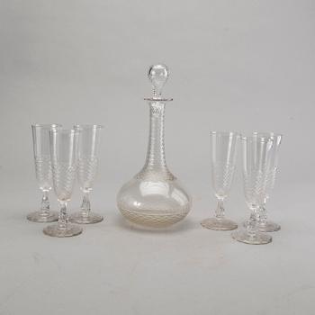 10+7 Champagne glasses, decanter, cut decor. First half of 20th century.