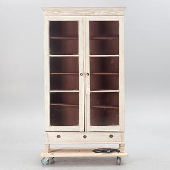 A Gustavian style display cabinet, circa 1900.