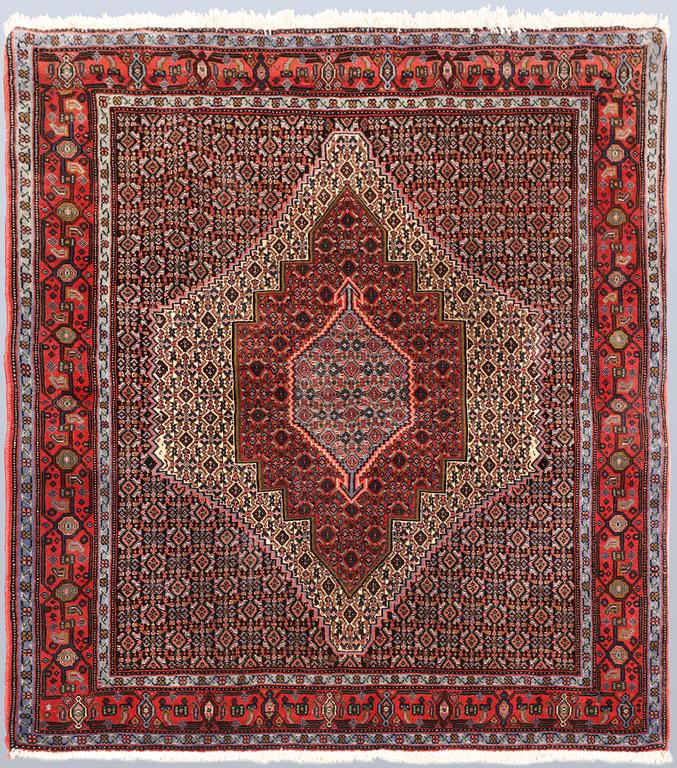 A Senneh rug, approx. 155 x 130 cm.