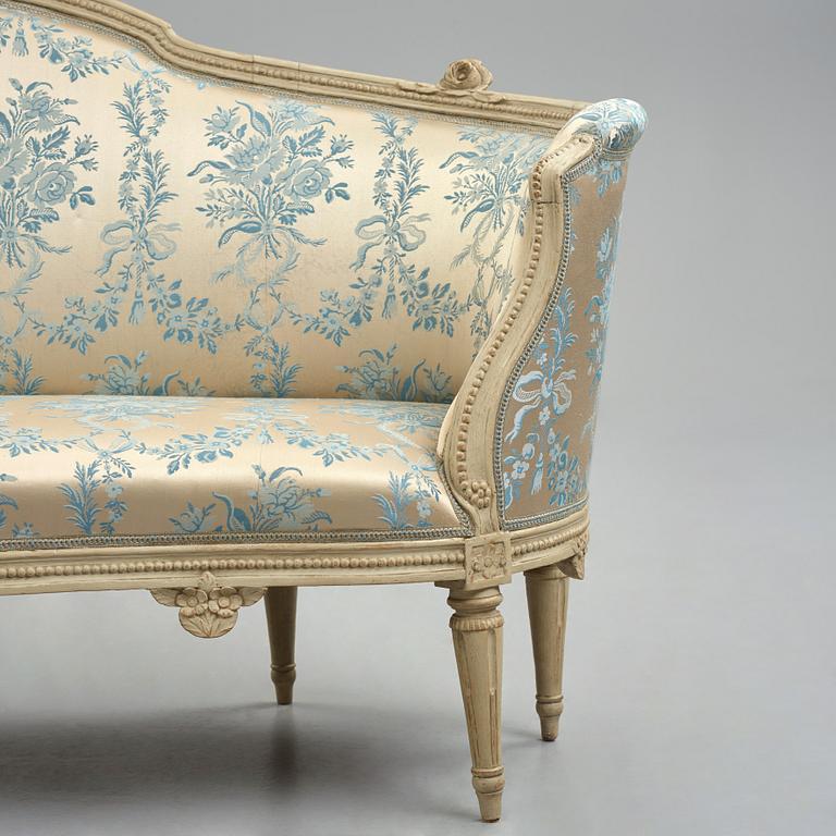 A grey-painted Gustavian 'canapé en corbeille'. sofa, by J E Höglander.