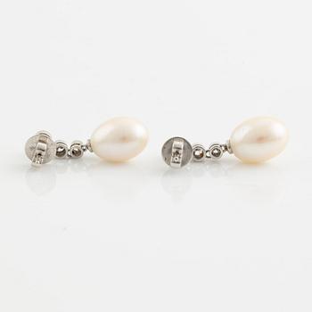 18K white gold, cultured pearl and brilliant cut diamond earrings.