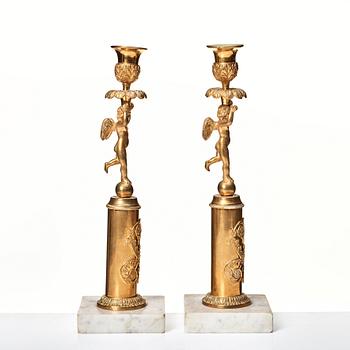 A pair of late Gustavian candlesticks.