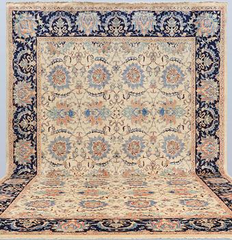 A Heris carpet, approx. 469 x 353 cm.