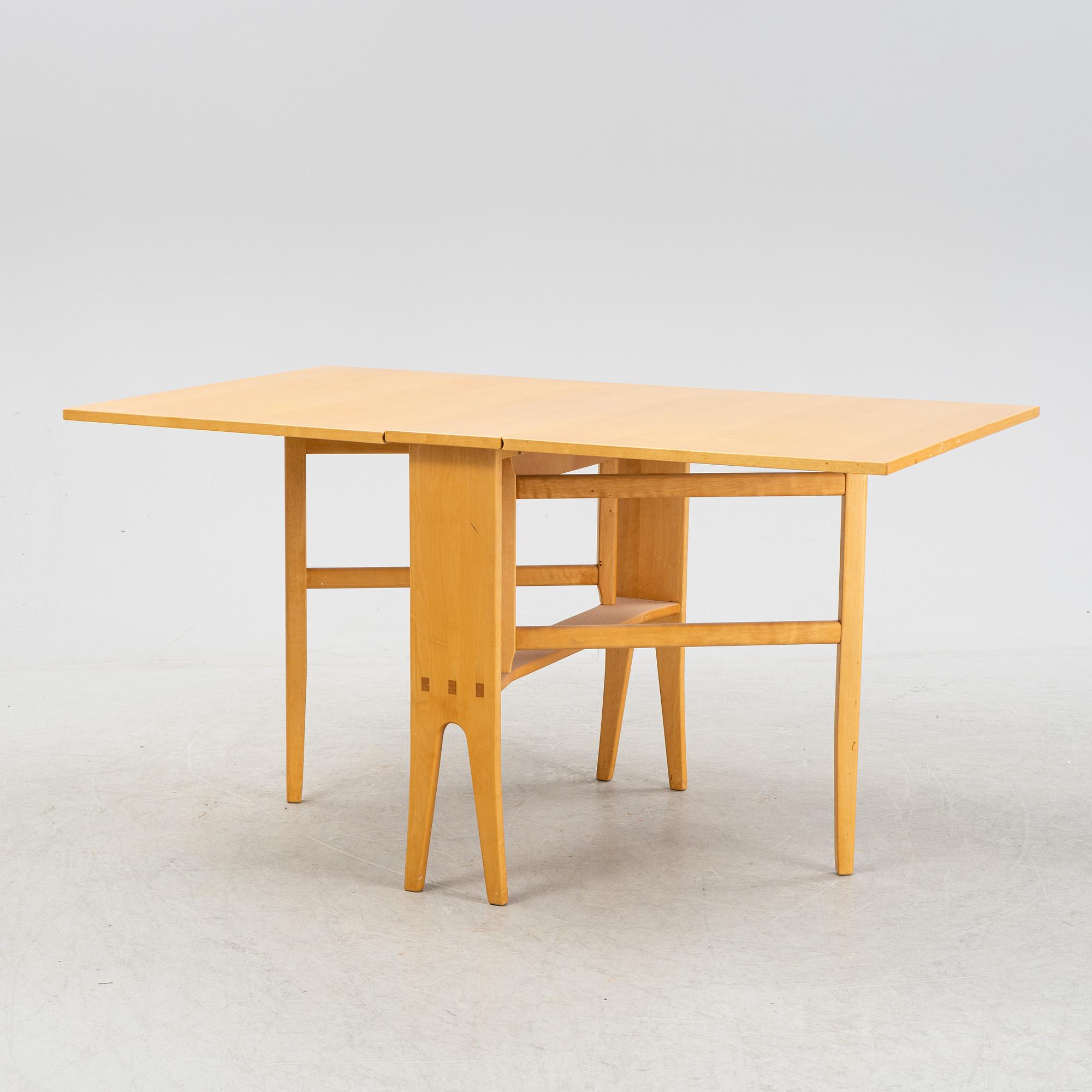 A 'Talavid' birch gate leg table by Carl Malmsten, end of the 20th Century.