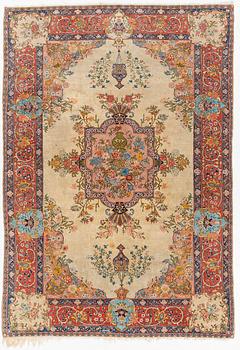 A semi-antique Tabriz carpet, West Persian, c. 250 x 175 cm.