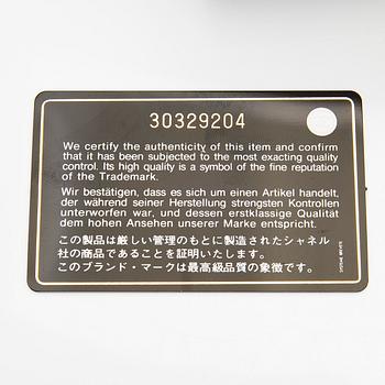 Chanel, A "19 O-coin purse" wallet.