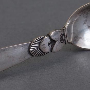 A set of 12+6 spoons by Georg Jensen,