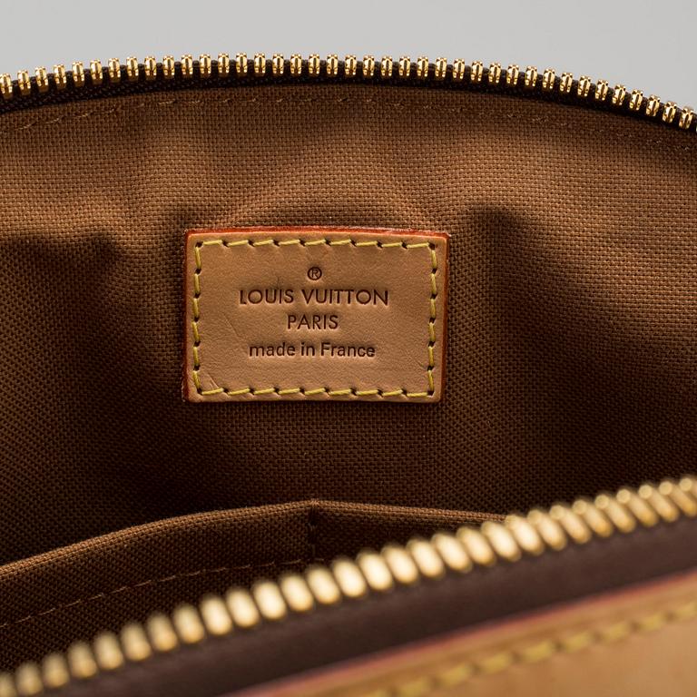 a LOUIS VUITTON 'Tivoli PM' bag.