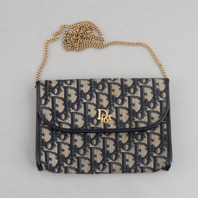 Christian Dior, a handbag/clutch.