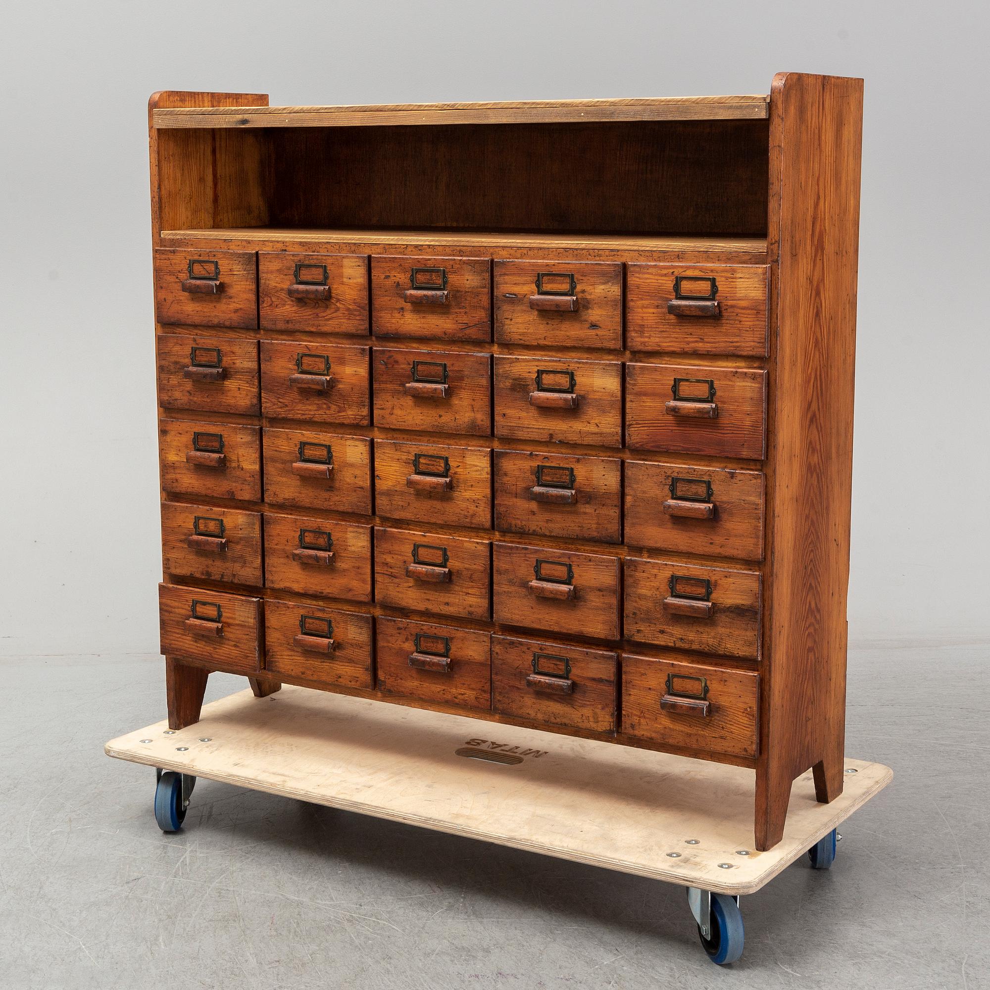 A circa 1900 chest of 20 drawers.