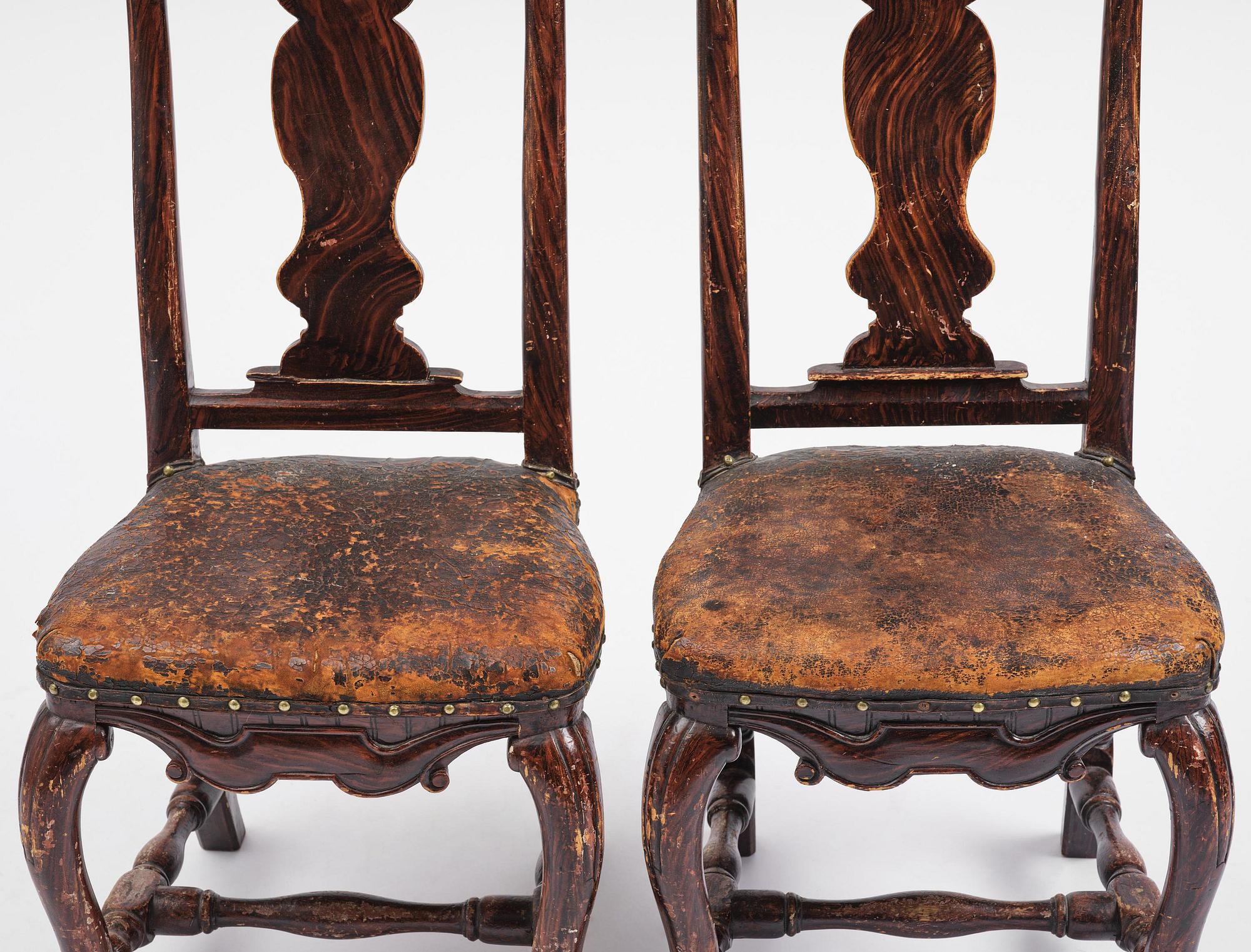 A pair of late baroque faux bois-painted chairs, attributed to M. Meling, 1730/40's.