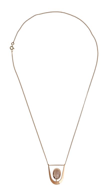 Eero Rislakki, A PENDANT, 14K gold, smoke quartz, N. Westerback 1962. Signed ER.
