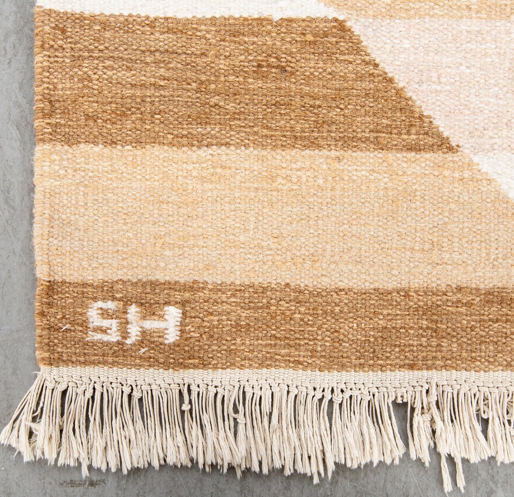 A flat weave carpet ca 240 x 170 cm.