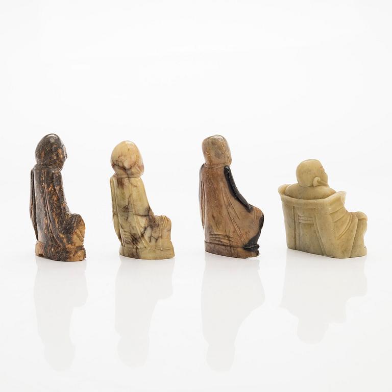 A set of four soapstone sculptures of Buddai, China, 20th century.