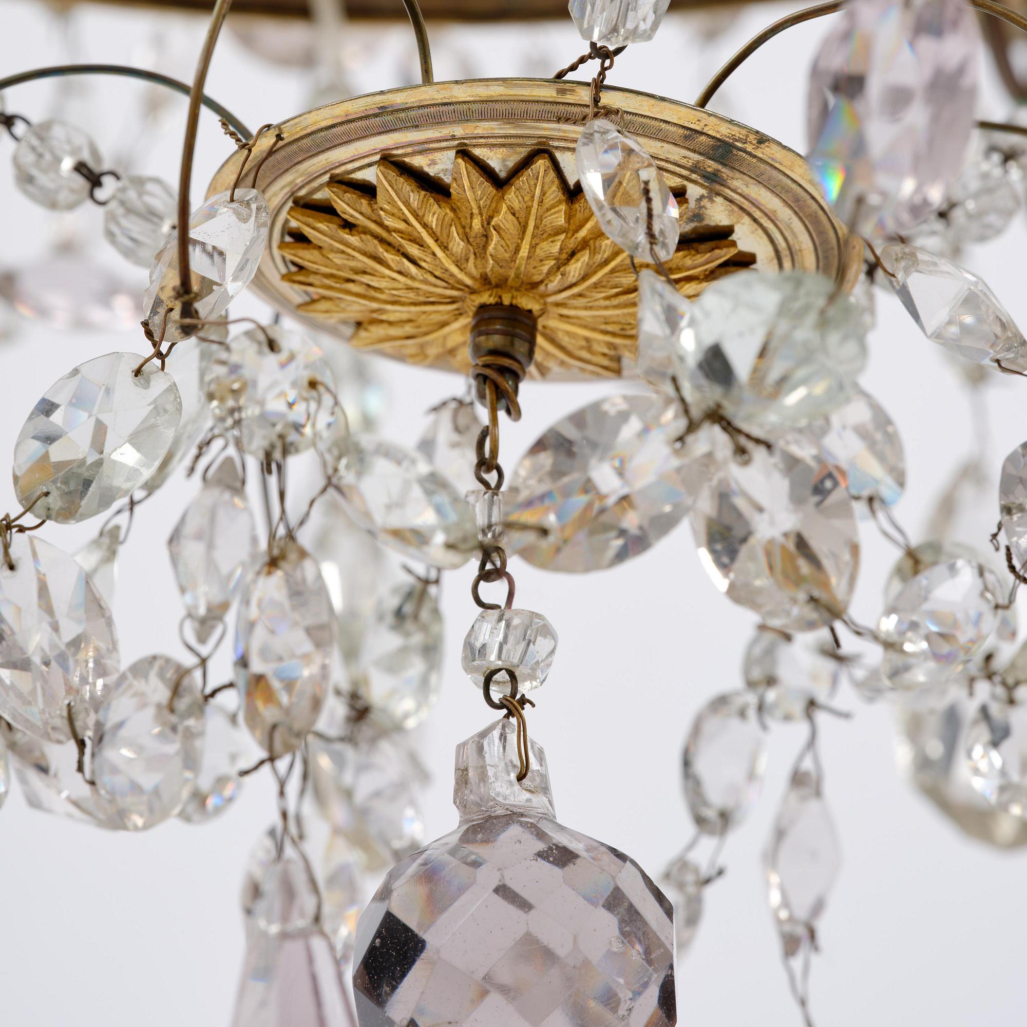 A Russian / Northern European Louis XVI-style gilt brass and blue glass six-branch chandelier, 19th century.