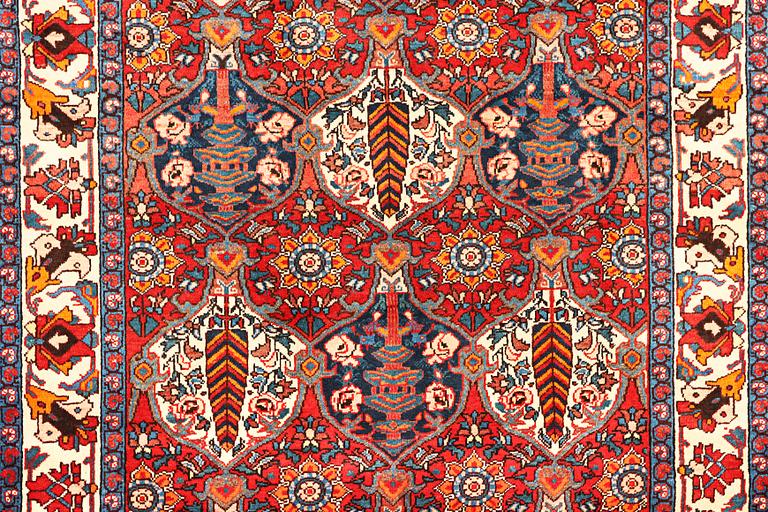 A Hamadan carpet, c. 335 x 184 cm.