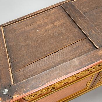 A French chest of drawer in Louis XVI style after Jean-Francois Leleu's school, late 19th century.