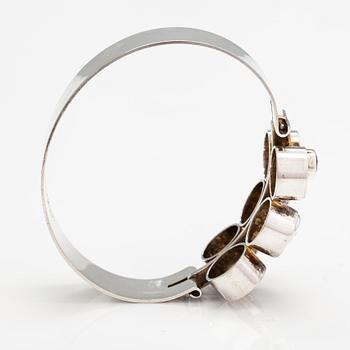 A silver bracelet with synthetic spinelles. Salovaara Ky kultaseppä, Kaarina 1966.