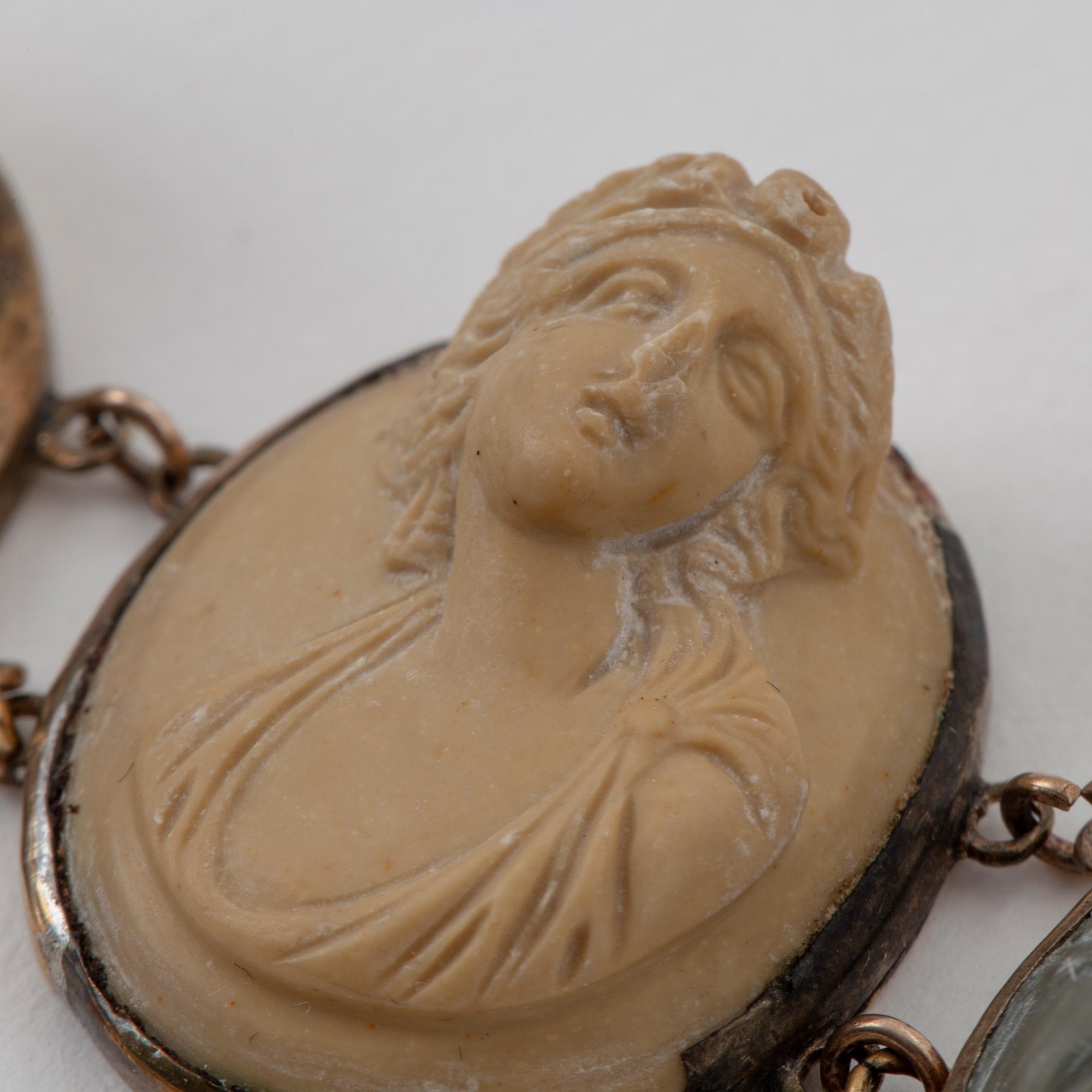 Silver and lava cameo necklace and bracelet.