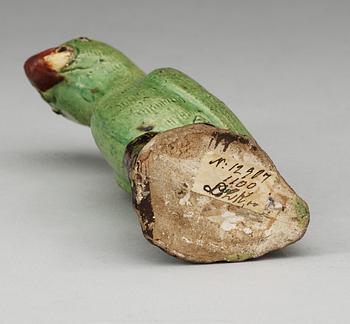 A green glazed figure of a bird, late Qing dynasty.