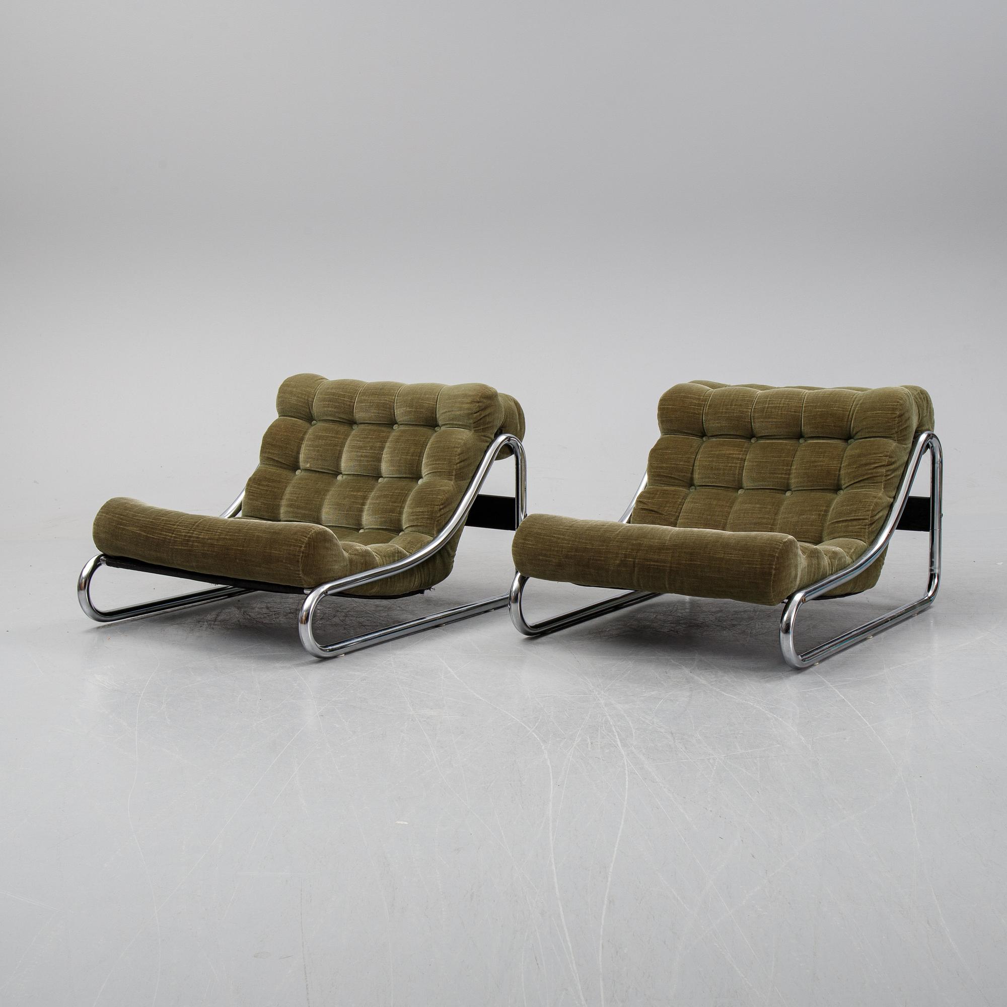 A pair of 'Impala' lounge chairs with table by Gillis Lundgren for IKEA, released 1972.