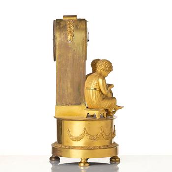 A French Empire ormolu mantel clock, early 19th century.