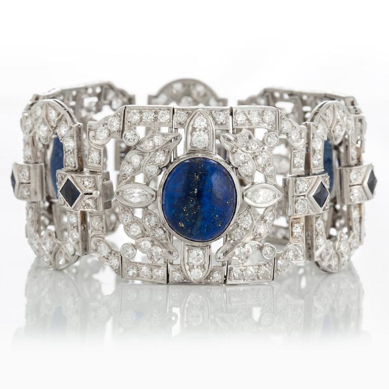 Armband med lapis lazuli, gammalslipade diamanter totalvikt ca 10 ct samt fasettslipade syntetiska safirer.